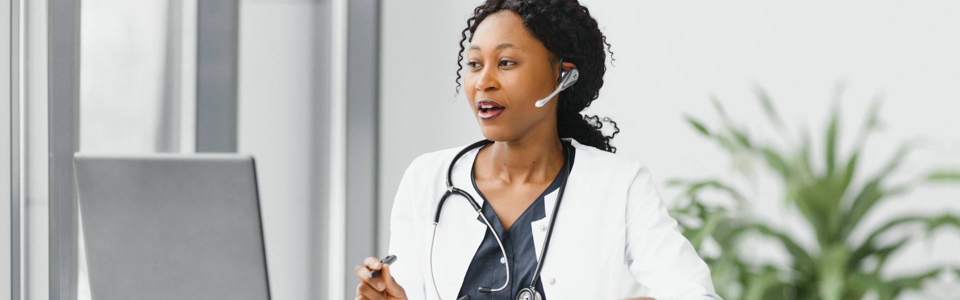 doctor wearing stethoscope and headset