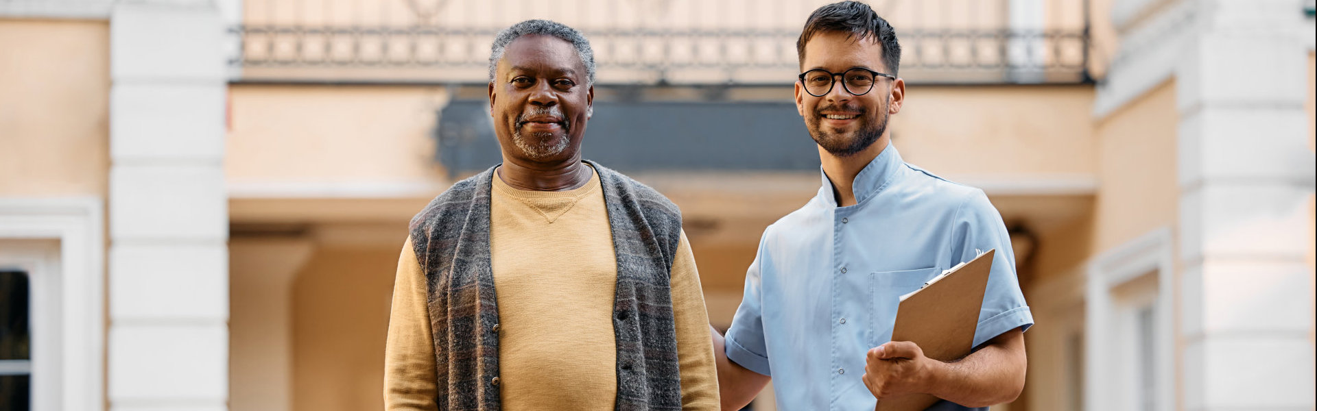 erderly man and young caregiver